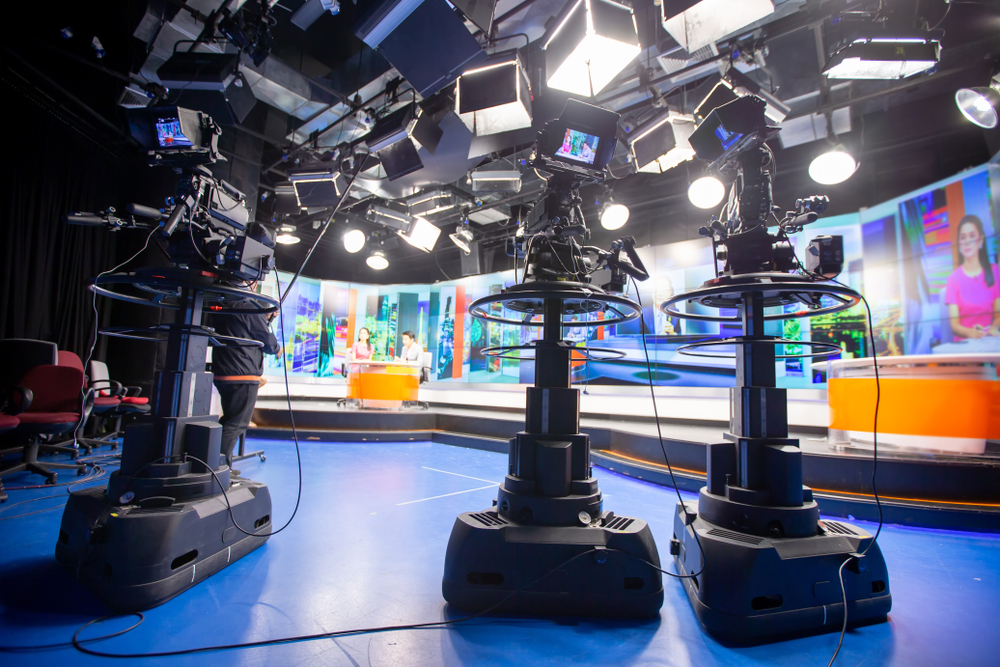 Camera,In,Studio,Are,Broadcasting,Journalists,Reading,News.blur,Background,Have