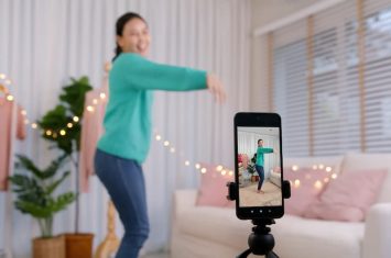 Woman Dancing in front of phone on a tripod